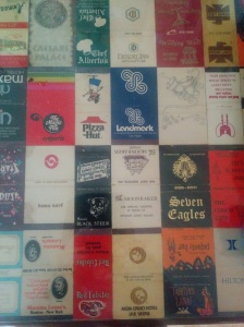 Matchbooks used to be given out at weddings and were commonplace freebies at hotels, restaurants and stores.  I love to trace my fingers over the countertop of the bar, as if to touch the memories of the times, places and events each matchbook came from. 